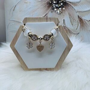 The Heart of Charms: Flower & Heart Charms Bracelet